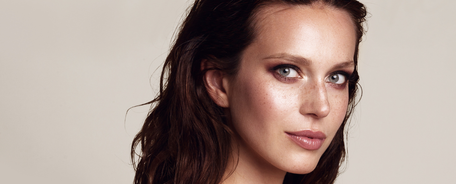Smoky Bronze Eye Makeup Los Angeles Celebrity Makeup Artist Kimberley Bosso Smoky bronze eye makeup with luminous freckled skin on a brunette model by Los Angeles celebrity makeup artist Kimberley Bosso